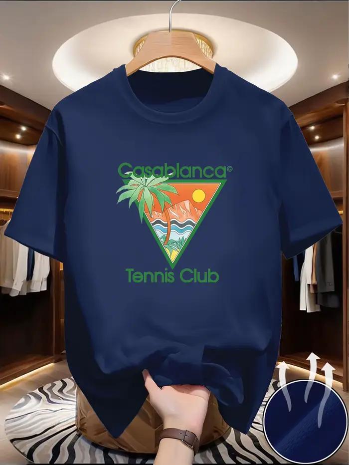 Ce t-shirt décontracté d'été présente un texte vert « Casablanca » et un motif triangulaire comprena