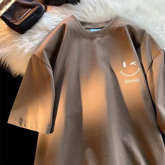 T-shirt graphique Wink Smiley Face pour hommes et femmes, t-shirt unisexe décontracté d'été à manche