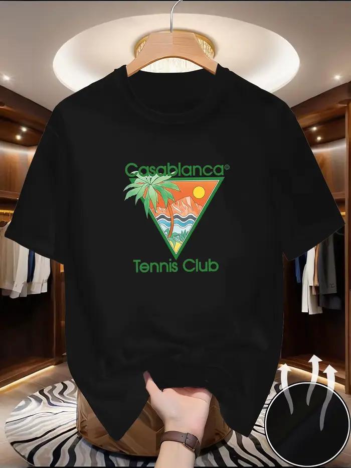 Ce t-shirt décontracté d'été présente un texte vert « Casablanca » et un motif triangulaire comprena