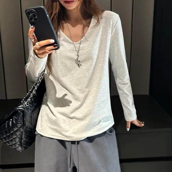 T-shirt gris à col en V et manches longues pour femme, collection automne 2026, couleur unie, coupe 