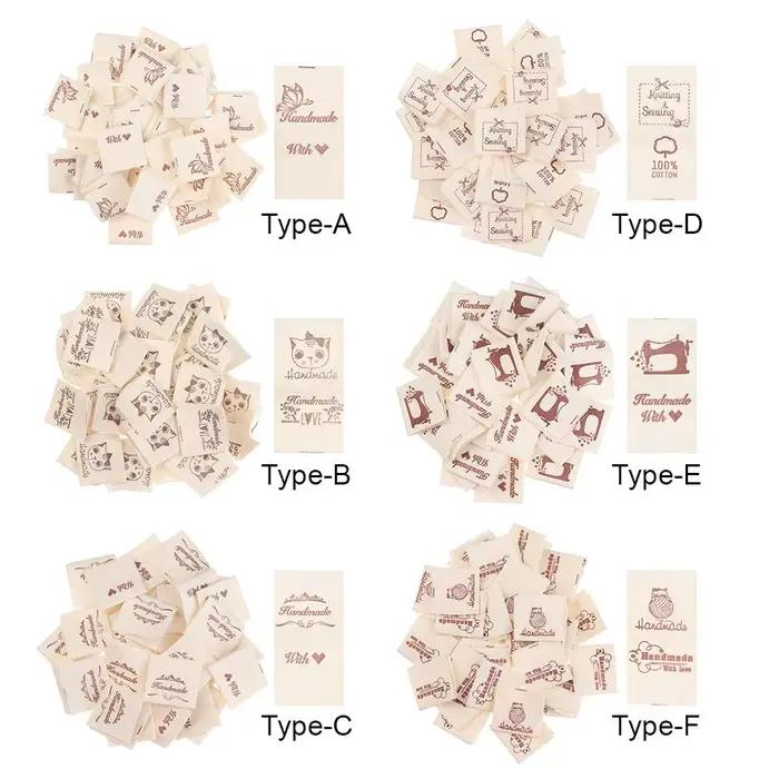 Étiquettes de vêtements en tissu faites à la main avec amour, 50 pièces, chat de dessin animé, cœur d'amour tissé, fournitures tricotées, accessoires de couture, étiquettes pour vêtements, bricolage