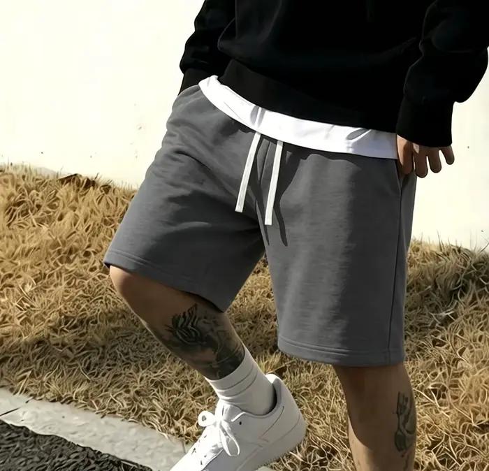 Shorts gris basiques simples pour hommes coupe ample cordon de serrage taille élastique coton pour jogging faire du shopping quatre saisons