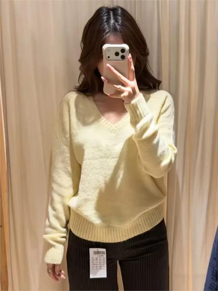 Pull tricoté jaune doux pour femme