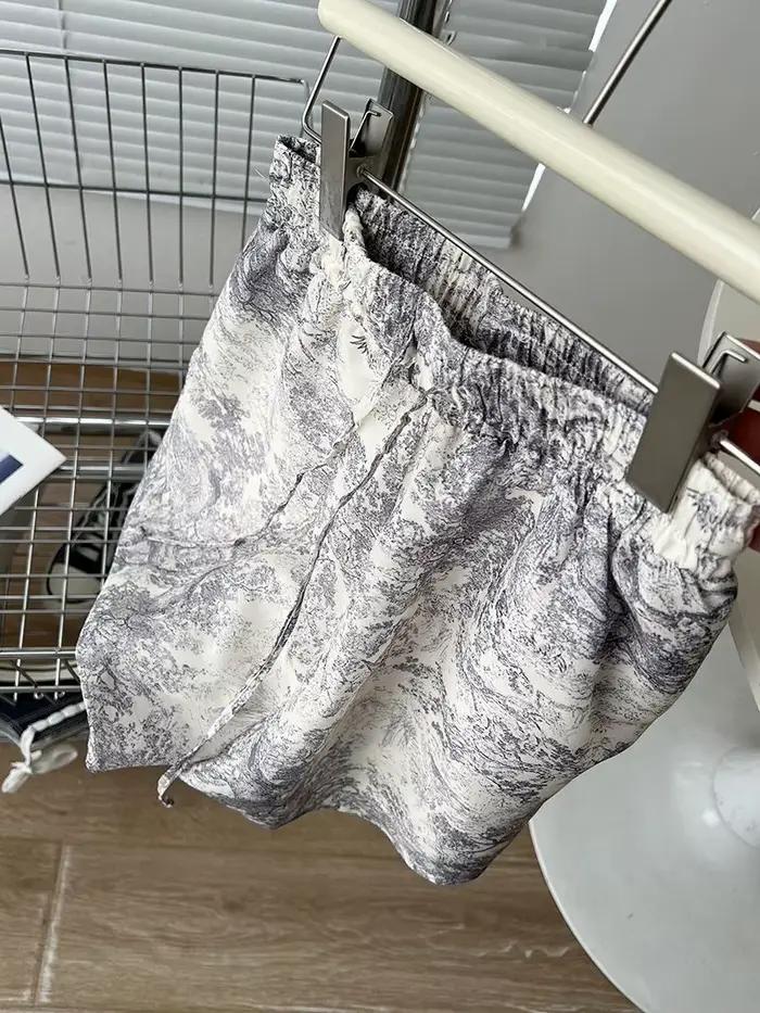 Short en mousseline de soie imprimé à l'encre de tempérament pour femmes, articles chauds d'été, cool, respirant, taille élastique, pantalon décontracté à jambes larges