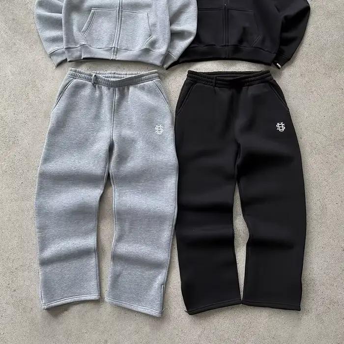 Pantalon de survêtement avec cordon de serrage et fermeture éclair