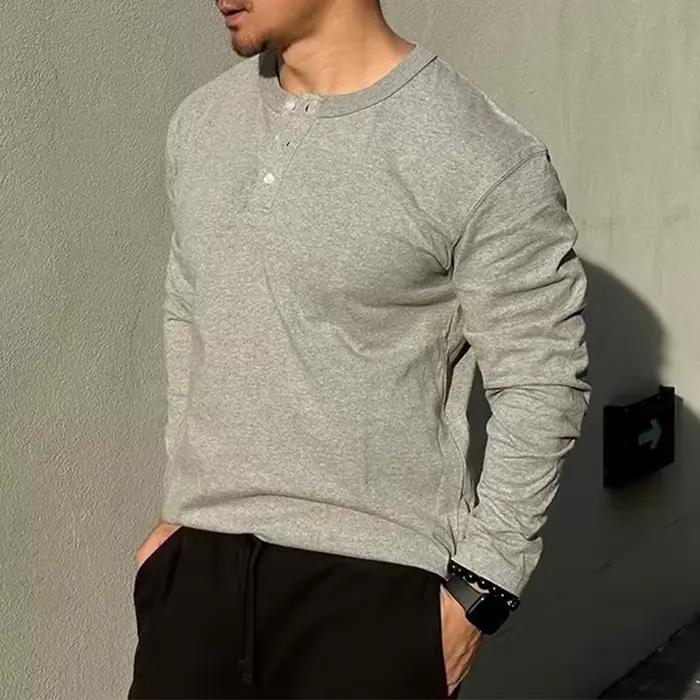 Pull à col rond boutonné pour hommes