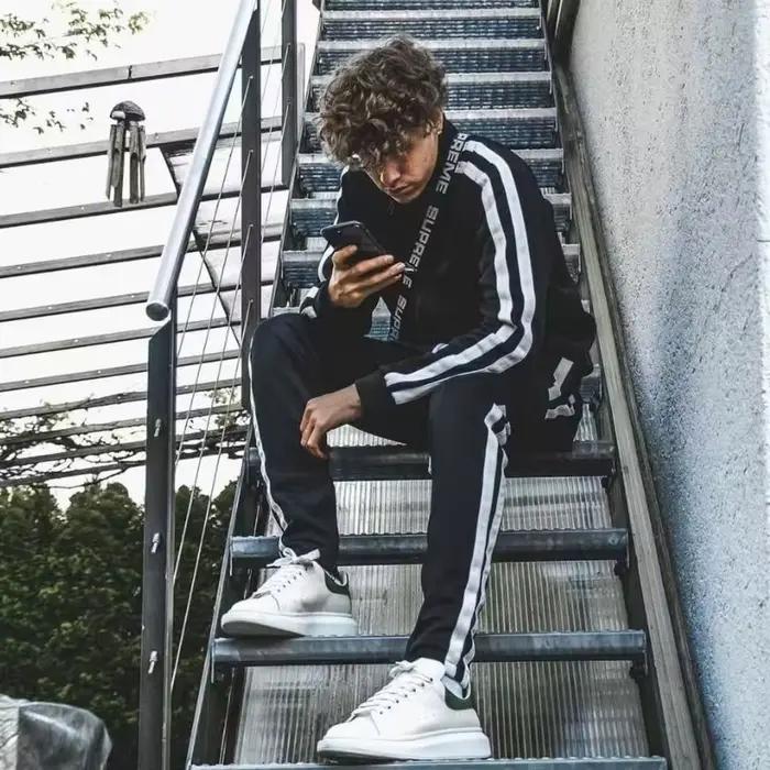 Mode rayures survêtement pour hommes fermeture éclair sweat à capuche et pantalons de survêtement de