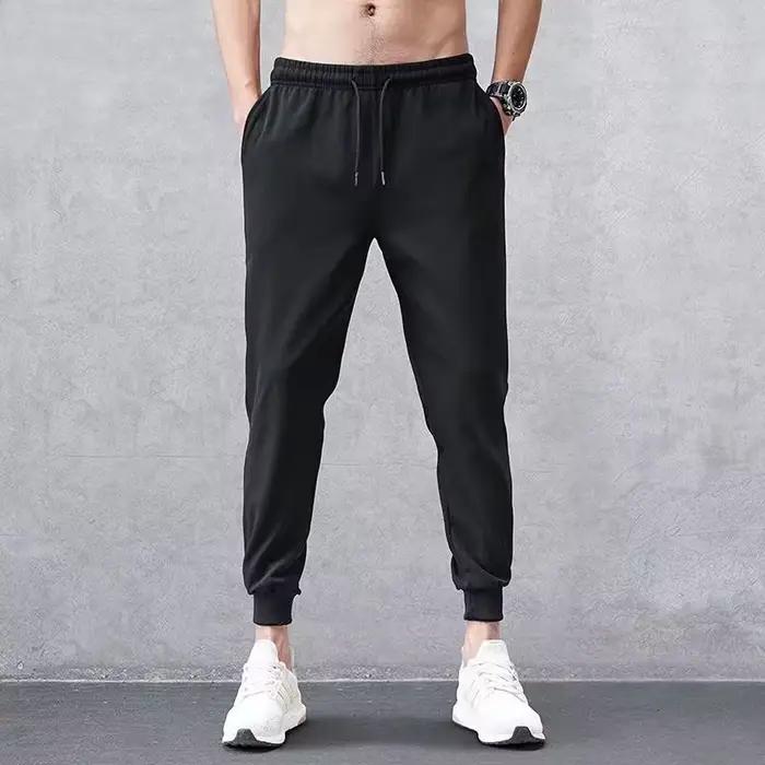 Pantalon de jogging pour homme avec côtés contrastés et boutons