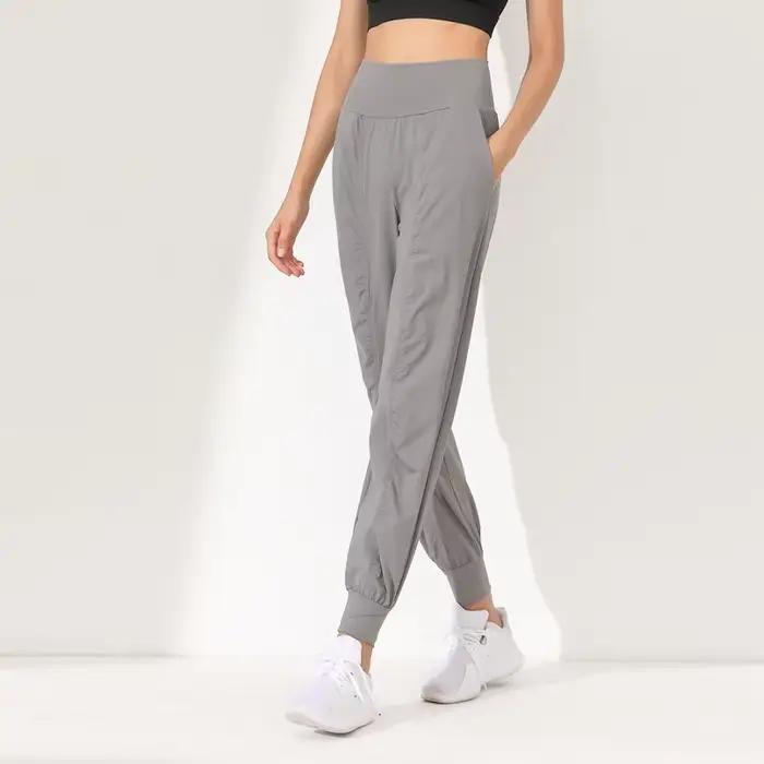 Pantalon de Yoga ample, Slim, séchage rapide, ourlet plissé, lié, course à pied, Fitness, poches Capris, pantalon de Jogging pour femme