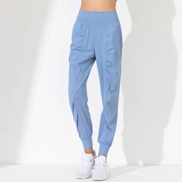 Pantalon de Yoga ample, Slim, séchage rapide, ourlet plissé, lié, course à pied, Fitness, poches Capris, pantalon de Jogging pour femme