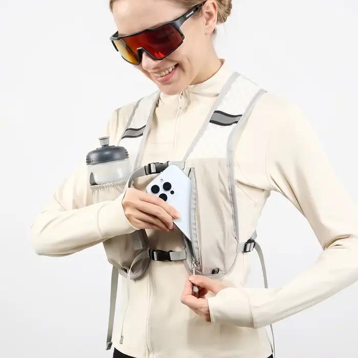 Gilet de course et de cyclisme léger avec poches réfléchissantes pour l'hydratation et le rangement du téléphone