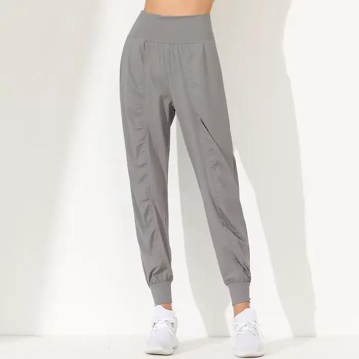 Pantalon de Yoga ample, Slim, séchage rapide, ourlet plissé, lié, course à pied, Fitness, poches Capris, pantalon de Jogging pour femme